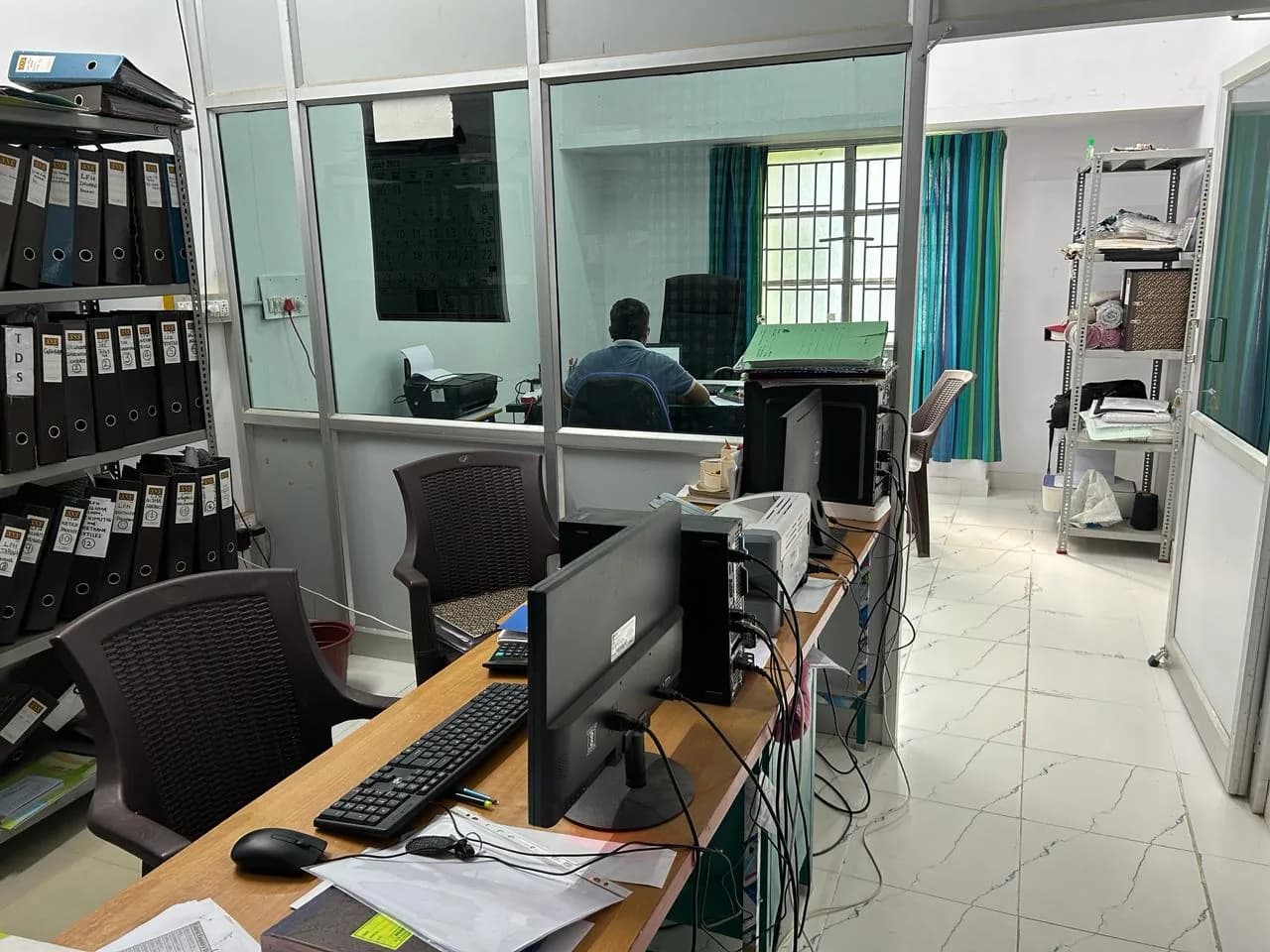 Fabric being inspected on the floor of the DBS Pacific unit at Karur